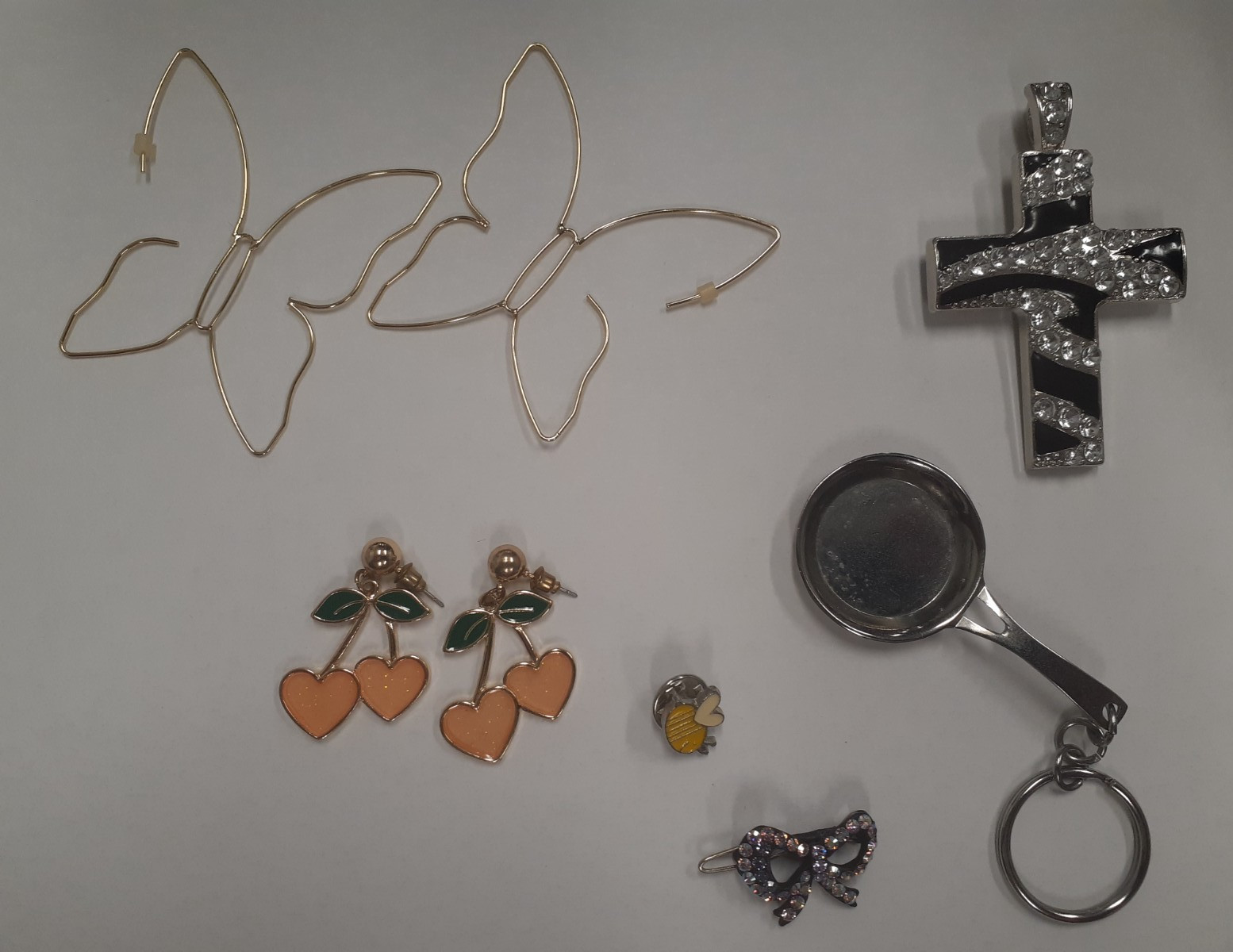 Jewelry Lot 1 – Cross, Butterfly Earings, Pan, Ribbon/Bow, bee pin, Peach/Heart