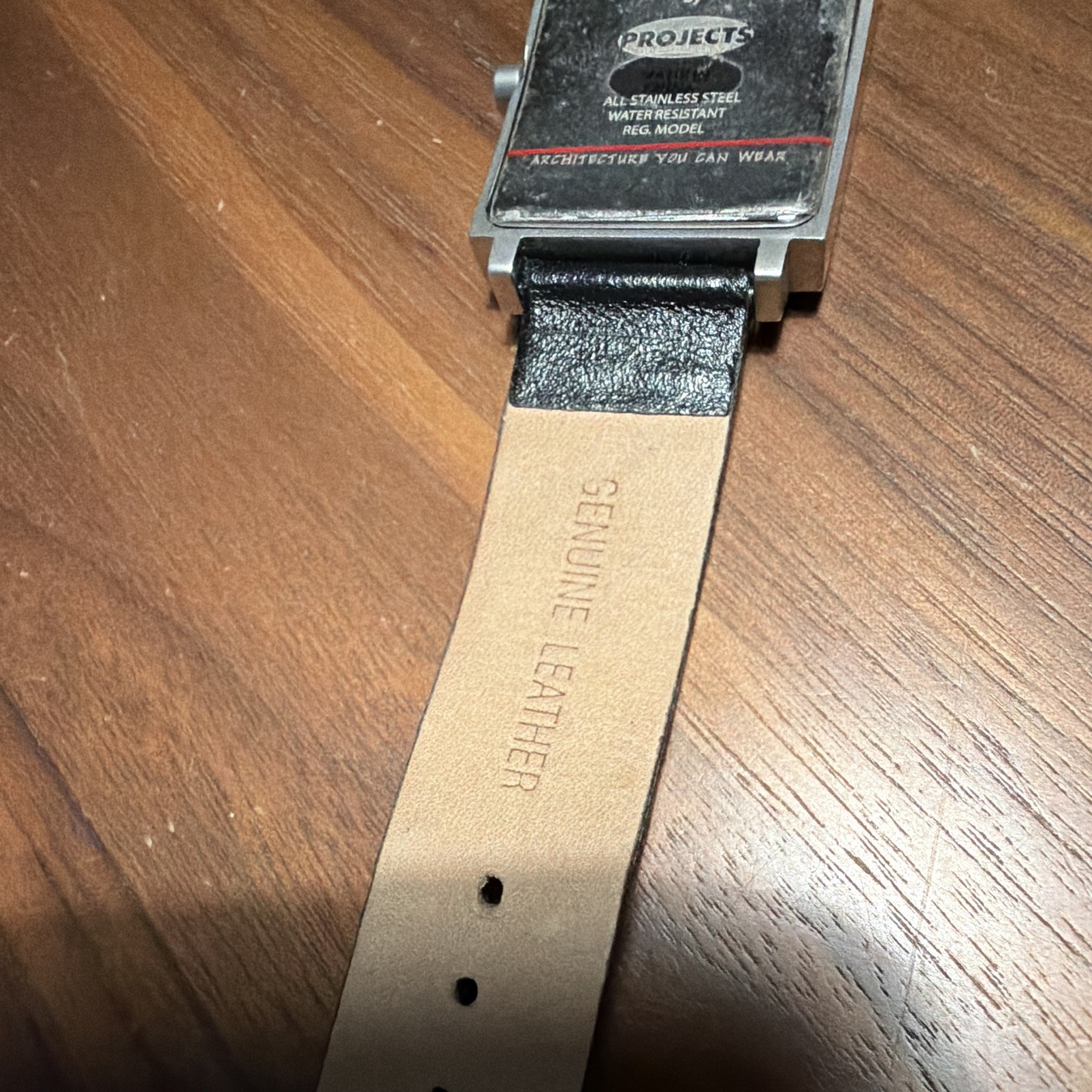 Projects Shenandoah Quartz Red Dial Rectangle SS Watch Black Leather