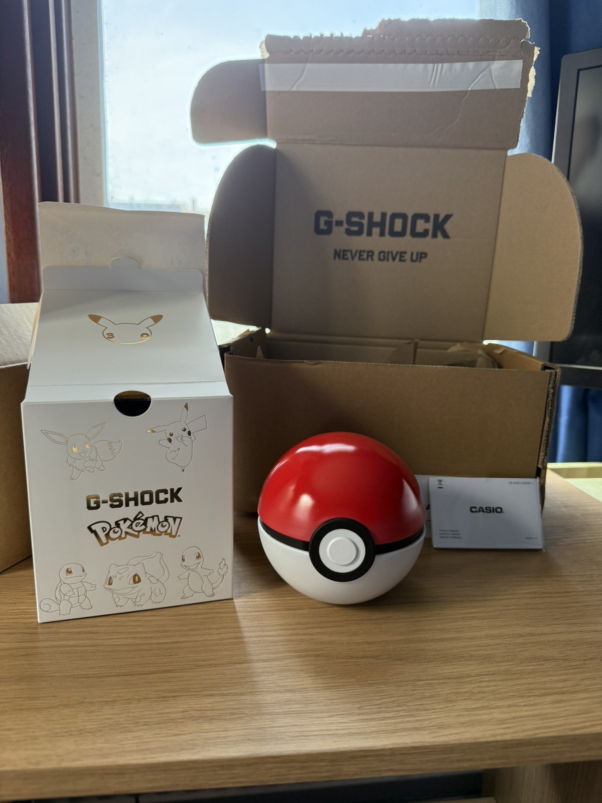 CASIO G-SHOCK x Pokemon 30th Anniversary GA110PKM-7A Watch In Hand