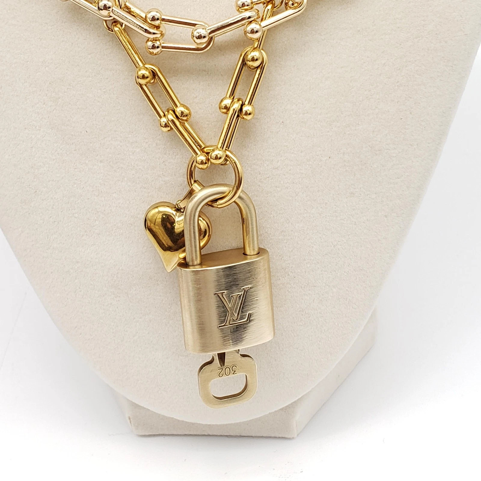 2 Stainless Gold Plated Necklace With Authentic Louis Vuitton Gold Lock Pendant