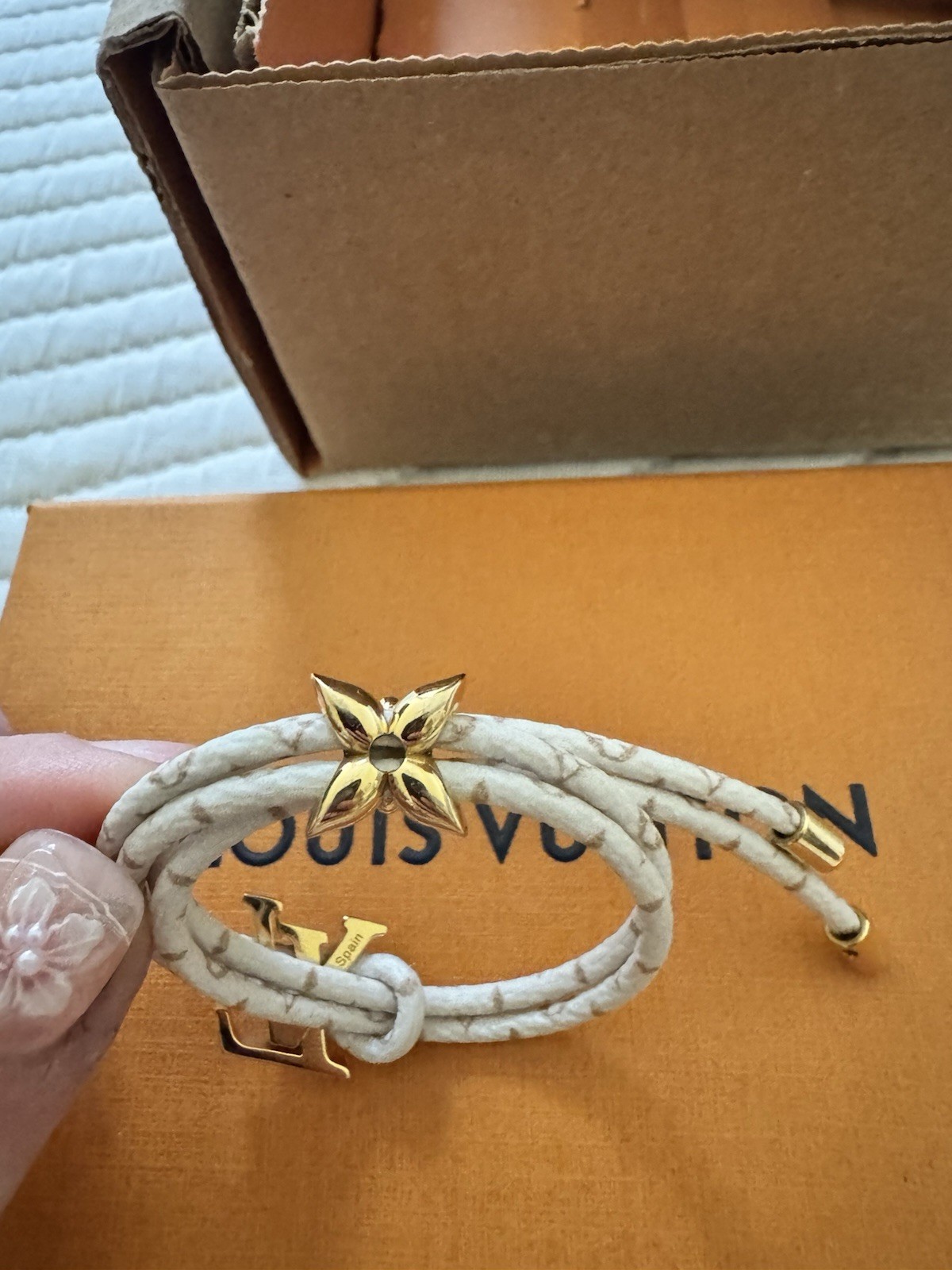 Louis Vuitton Signed Bloom White Wrap Bracelet w/ LV Charm, Drawstring, Sizable