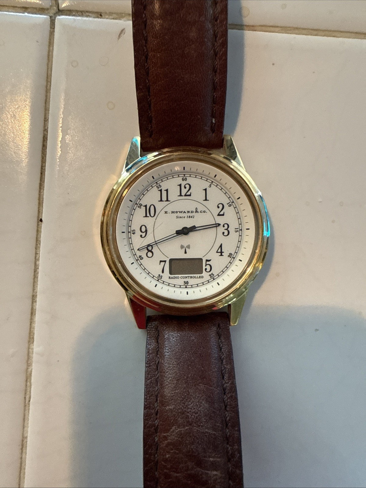 E Howard & Co Radio Controlled Atomic Watch Junghans Movement Gold Brown Leather